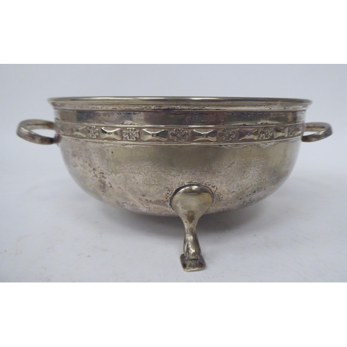 222 - Domestic and decorative metalware: to include a galleried, twin handled tray  16