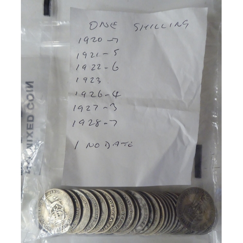 223 - A collection of mainly British 20thC interwar period silver coinage: to include shillings, half-crow... 