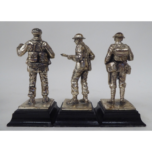 228 - A series of nine similar white metal models, British uniformed soldiers, on plinths  approx. 4.... 