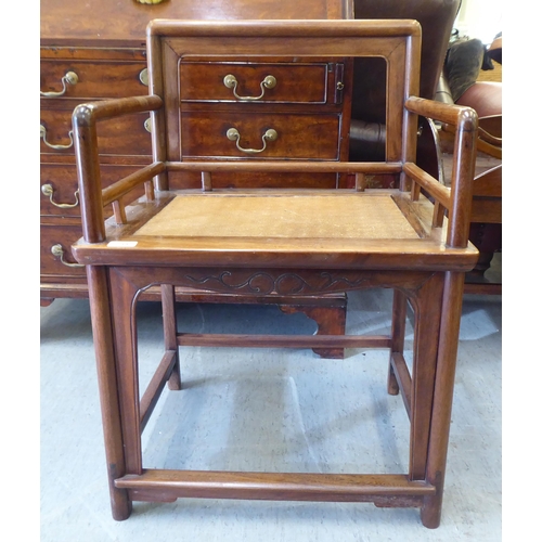 239 - A 20thC Chinese Huanghuali style fruitwood framed chair