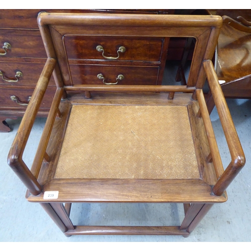 239 - A 20thC Chinese Huanghuali style fruitwood framed chair