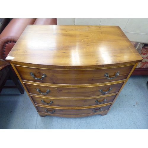 241 - A modern string inlaid yewwood bowfront, four drawer dressing chest, raised on bracket feet  32... 