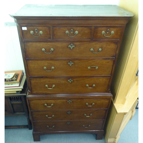 242 - A 19thC mahogany chest-on-chest with a moulded cornice, over an arrangement of three short/six long ... 