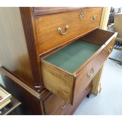 242 - A 19thC mahogany chest-on-chest with a moulded cornice, over an arrangement of three short/six long ... 