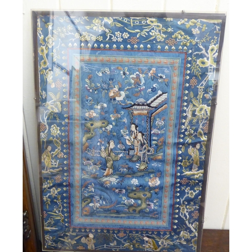 247 - Oriental artwork, textiles and carved wooden plaques  mixed sizes  mostly framed