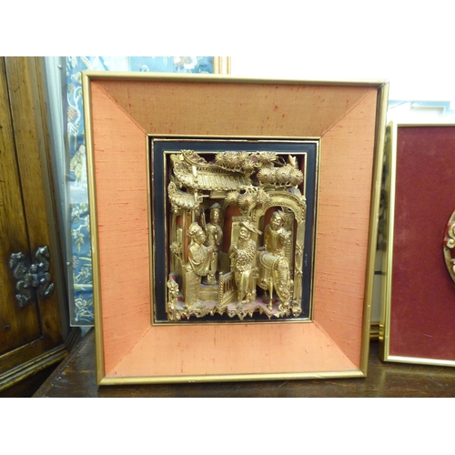 247 - Oriental artwork, textiles and carved wooden plaques  mixed sizes  mostly framed