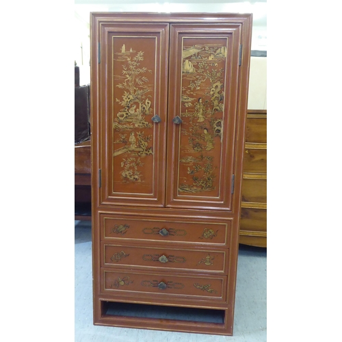 252 - A modern painted Chinese cabinet with a pair of doors, enclosing eight drawers, over three long draw... 