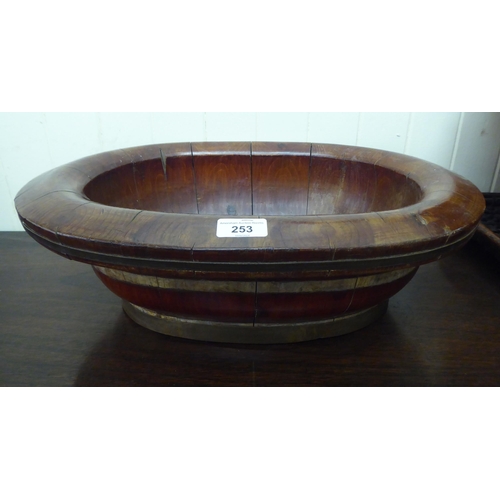 253 - Oriental wooden items: to include a fruitwood wash bowl  20