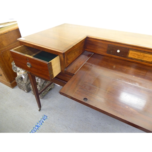 255 - A 19thC ebony and string inlaid mahogany, inverted breakfront three drawer desk-on-stand  35