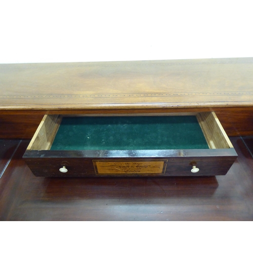 255 - A 19thC ebony and string inlaid mahogany, inverted breakfront three drawer desk-on-stand  35