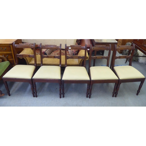 268 - A set of five William IV mahogany framed, twin bar back dining chairs, the later fabric upholstered ... 