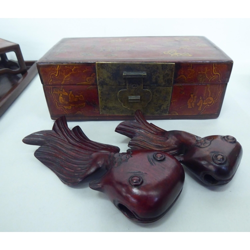 273 - Asian collectables: to include wooden stands; and two part boxes