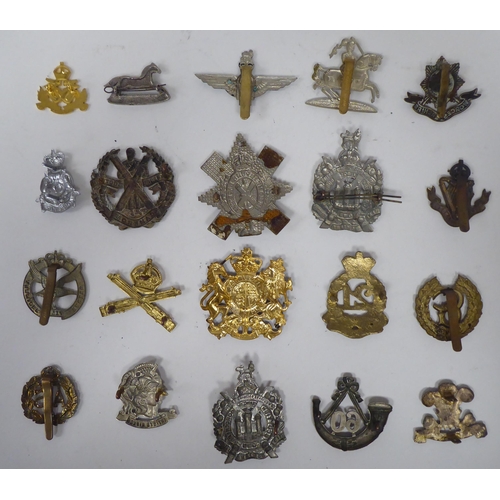 275 - Approx. twenty military cap badges and other insignia, some copies: to include Glider Pilot Regiment... 