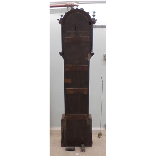 279 - A late 18thC mahogany longcase clock, the arched fretworked hood and glazed window, between reeded f... 