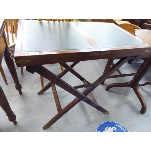 281 - A modern mahogany two-part 'pop up' folding desk, on a crossover underframe  30