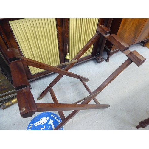 281 - A modern mahogany two-part 'pop up' folding desk, on a crossover underframe  30