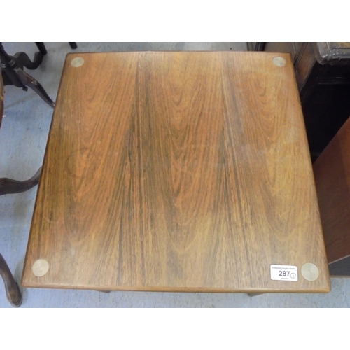 287 - A Farum, Made in Denmark, rosewood lamp table, model no.9840, raised on turned, tapered legs  1... 