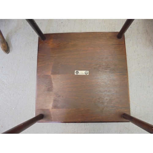 287 - A Farum, Made in Denmark, rosewood lamp table, model no.9840, raised on turned, tapered legs  1... 