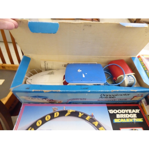 306 - Toys: to include a Schuco Samara II Ferngesteuettes Elektro-Boot; and a Scalextric pole position sou... 