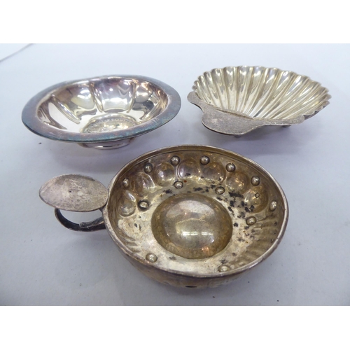 307 - Silver and white metal collectables: to include a scallop shape butter dish  London marks rubbe... 