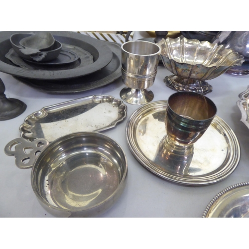 314 - Metalware: to include a silver plated tray of oval form with a bead edge  12