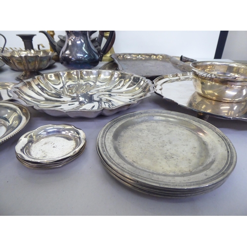 314 - Metalware: to include a silver plated tray of oval form with a bead edge  12