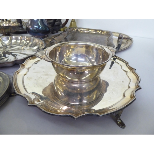 314 - Metalware: to include a silver plated tray of oval form with a bead edge  12