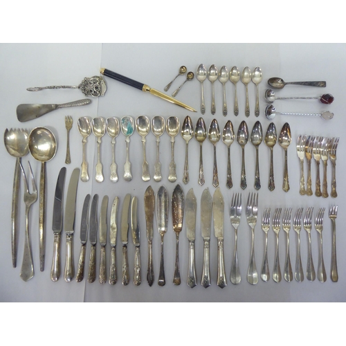 319 - Silver and white metal flatware: to include a pair of Continental serving spoons  bears indisti... 