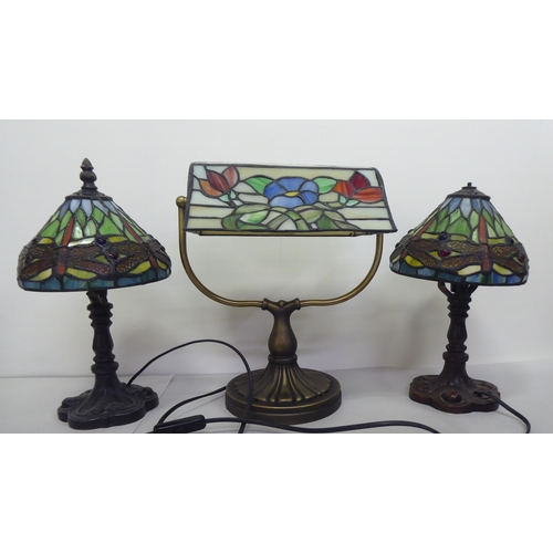 334 - Table lamps: to include a Tiffany style example with a glass shade  12