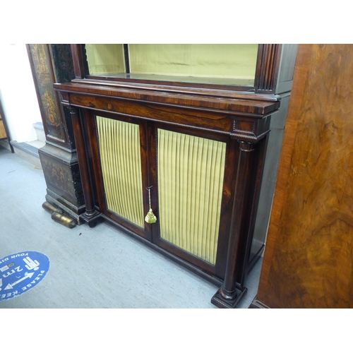 342 - A Regency rosewood chiffonier bookcase, the superstructure with a moulded cornice, over three height... 