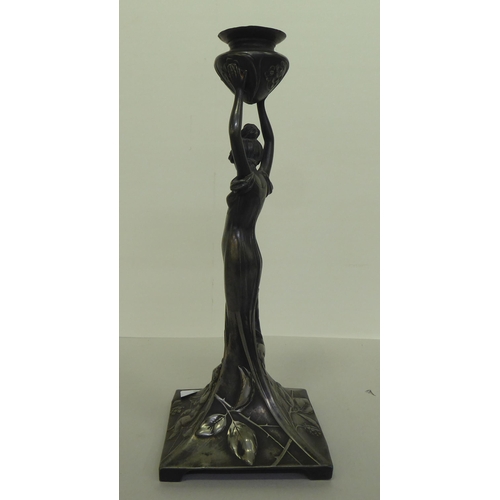 362 - An Art Nouveau pewter lamp base, fashioned as a woman holding a vase  14