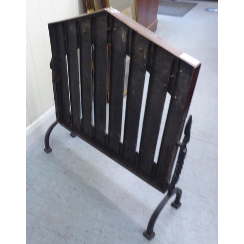 376 - An Arts & Crafts riveted copper and cast iron firescreen, designed as a car radiator grill  25