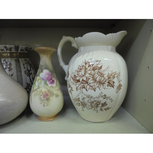 378 - Decorative ceramics: to include a 19thC Ridgeways Cherry jug  10.5