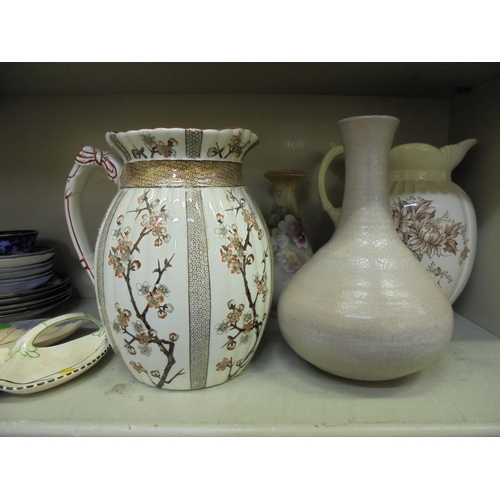 378 - Decorative ceramics: to include a 19thC Ridgeways Cherry jug  10.5