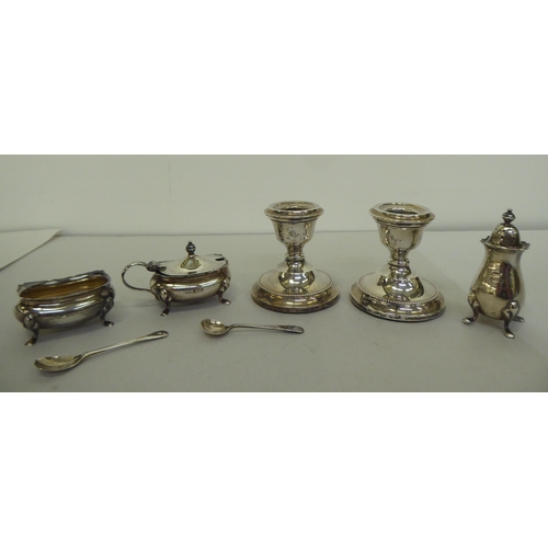 379 - Silver collectables: to include a pair of dwarf candlesticks  3