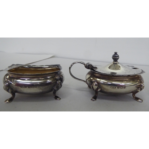 379 - Silver collectables: to include a pair of dwarf candlesticks  3