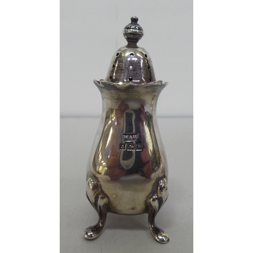 379 - Silver collectables: to include a pair of dwarf candlesticks  3