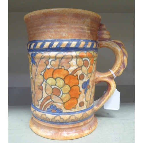 383 - A Charlotte Rhead for Crown Ducal jug, decorated with floral patterns