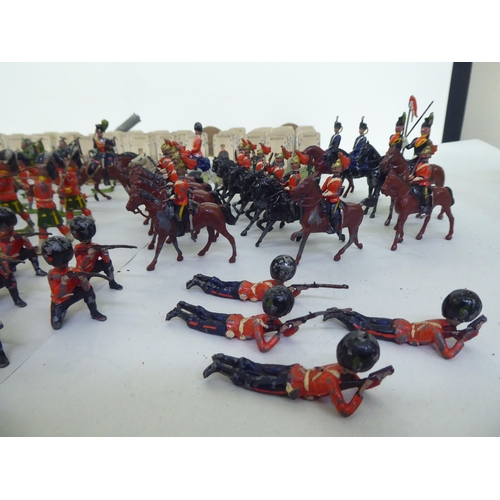 385 - Britains and other painted metal Zulu warriors, soldiers and accessories