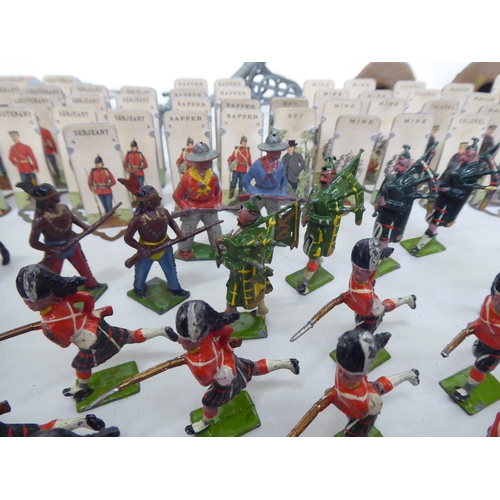 385 - Britains and other painted metal Zulu warriors, soldiers and accessories