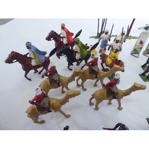 385 - Britains and other painted metal Zulu warriors, soldiers and accessories