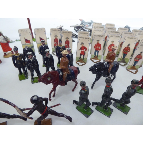 385 - Britains and other painted metal Zulu warriors, soldiers and accessories