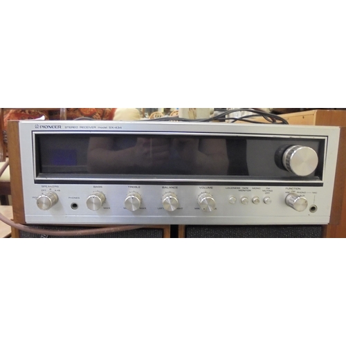 387 - A Pioneer stereo receiver, model SX.434; and a pair of Celestion 15 speakers  21