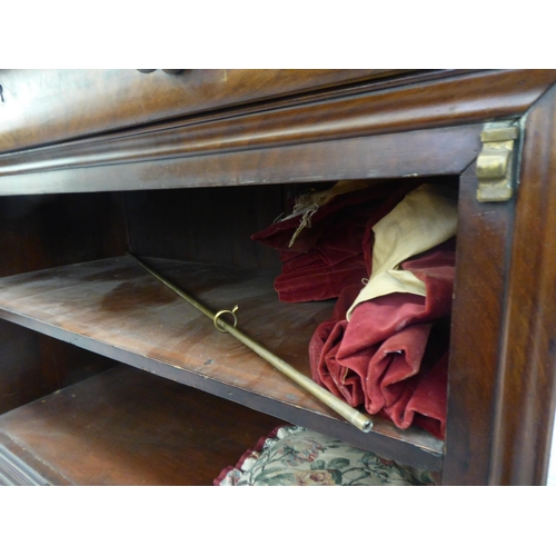 48 - A late 19thC Continental walnut open front cabinet with a mottled grey marble top, over a cushion mo... 