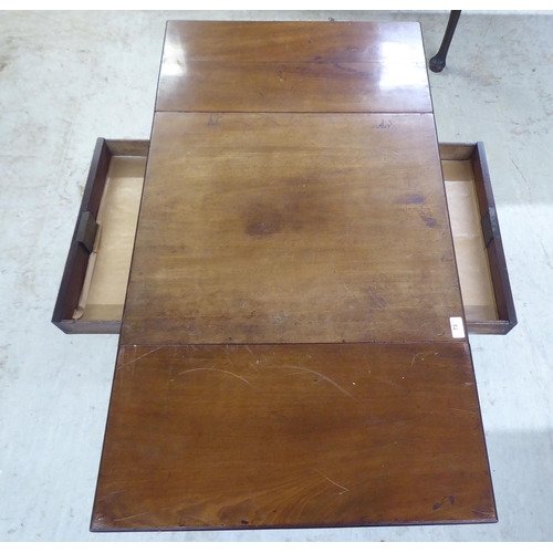 73 - A late 19thC mahogany drop leaf occasional table, raised on square legs and casters  17