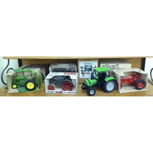 219 - Diecast model vehicles: to include an Ertl Farmhall H Tractor  boxed