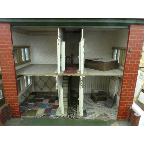 225 - A scratch built dolls house with a removeable front panel and divided interior  28