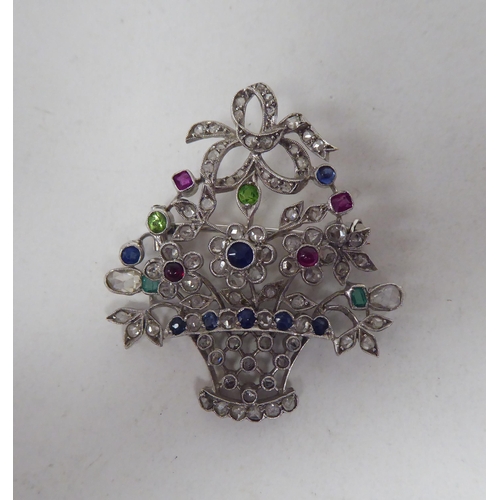 120 - An Edwardian style white metal brooch, set with diamonds and coloured stones, fashioned as a bunch o... 