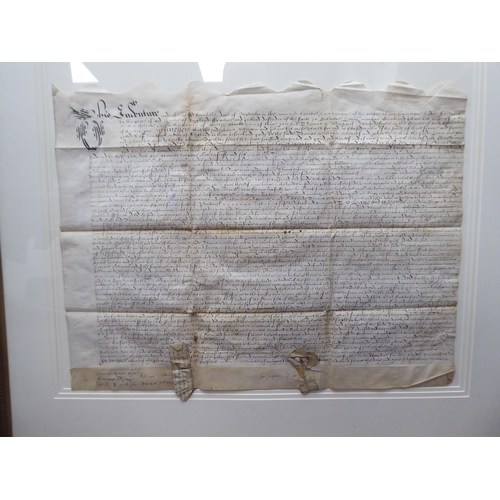 125 - An Elizabethan handwritten indenture, relating to land and cottages, located in Amersham, dated 1597... 