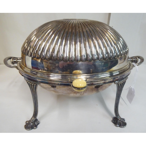 132 - A late Victorian silver plated breakfast dish with a ribbed, domed lid, on splayed legs  9